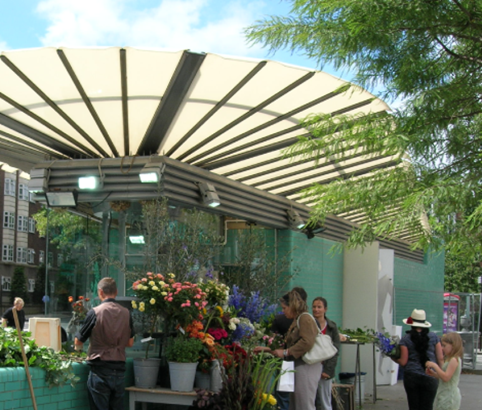 Retail activity extending into the public realm, Westbourne Grove, London